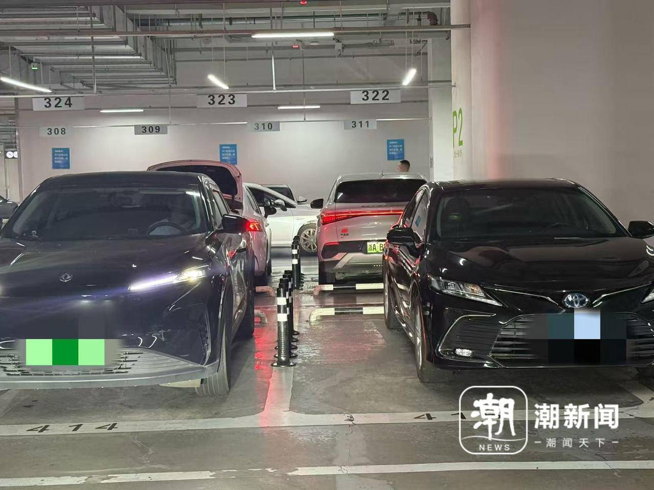 防了“开门杀”<strong></p>
<p>比特币换虚拟货币</strong>,却难了开车门?杭州西站网约车停车场软性护栏陷两难