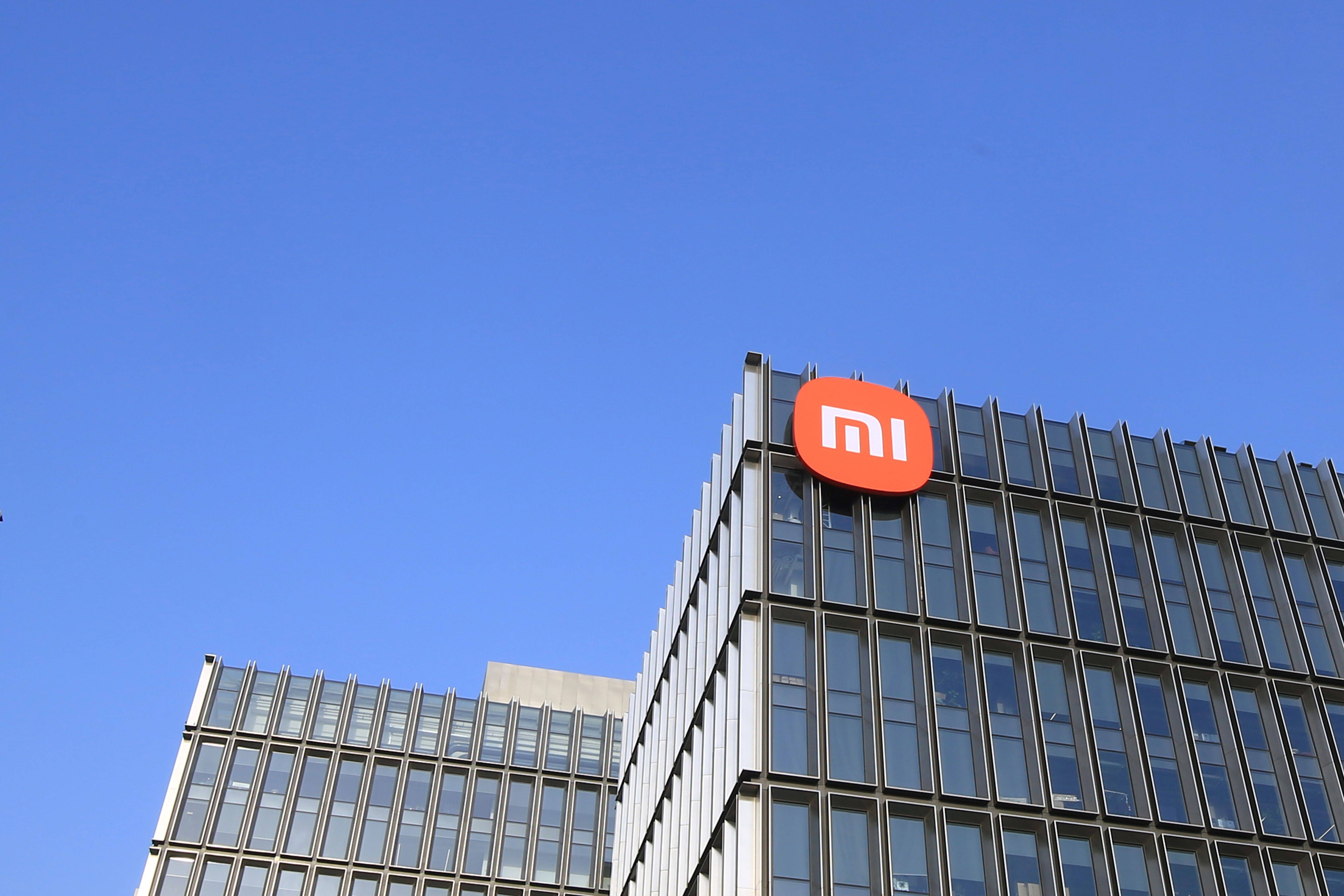 用实力回应质疑：小米Q3汽车业务首次盈利、手机/大家电成业绩强劲新引擎